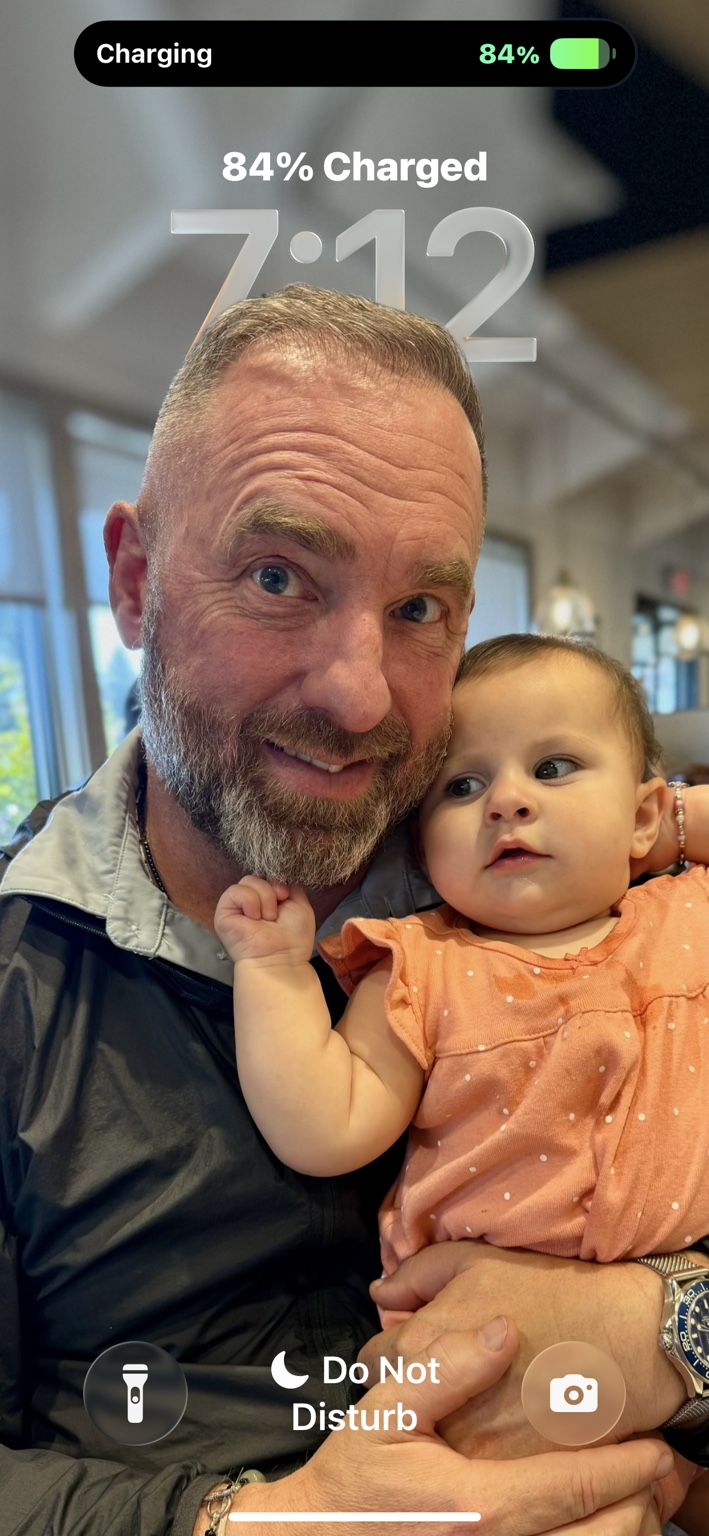 Aaron Chavez holding his granddaughter Melody